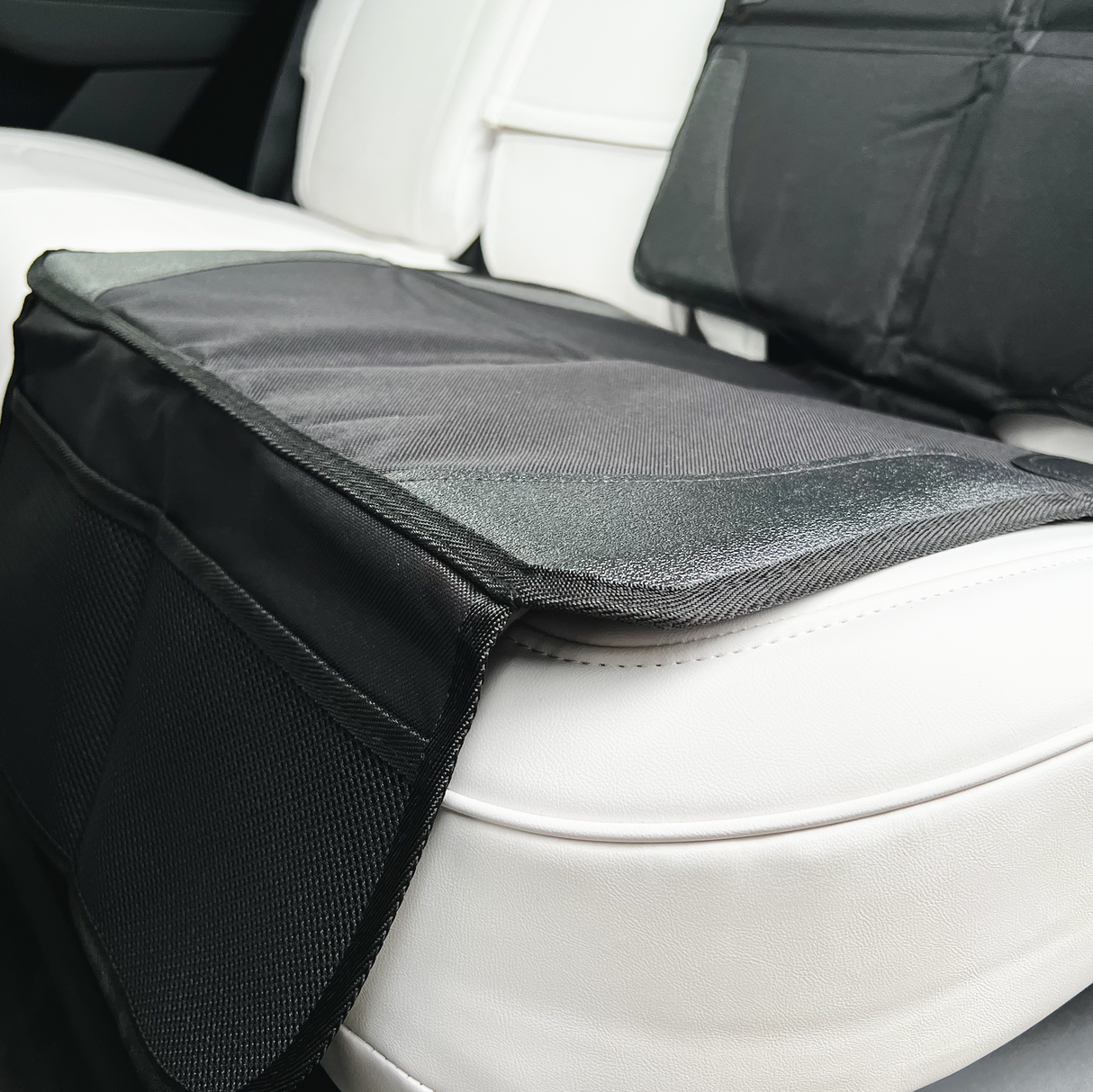 onderkant van de stoelbeschermer die op de stoel zit