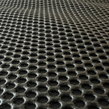 Inzoomen op de stof van de autostoelbeschermer