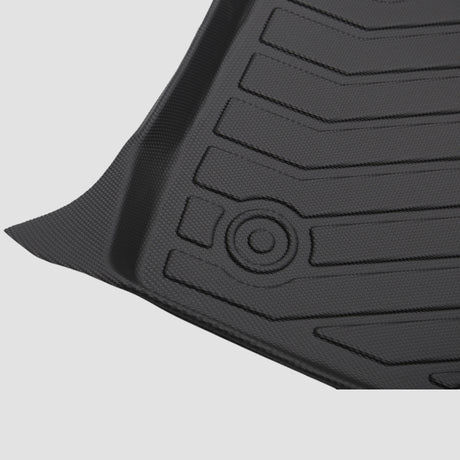 Detail van zwarte 3D All Weather mat met patroon en logo