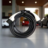 GCG MAX laadkabel Type 2 voor elektrische auto's, opgerold op een tegelvloer.