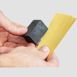 Reparatieset voor velgen met schuurbalk en schuurpapier voor autoverzorging.