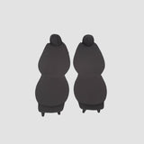 Stoelhoezen voor Tesla Model 3 en Model Y, van voren getoond op twee voorstoelen tegen een lichte achtergrond.