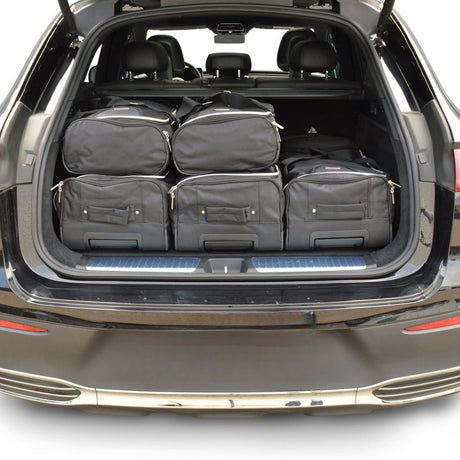 Bagagerum fyldt med seks pakkede Car-Bags rejsetasker set fra en anden vinkel