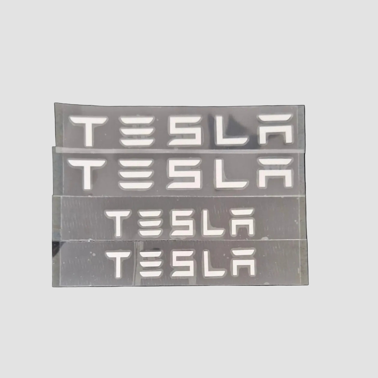 Letters "TESLA"