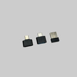 3 verschillende adapters voor de draadloze controller.